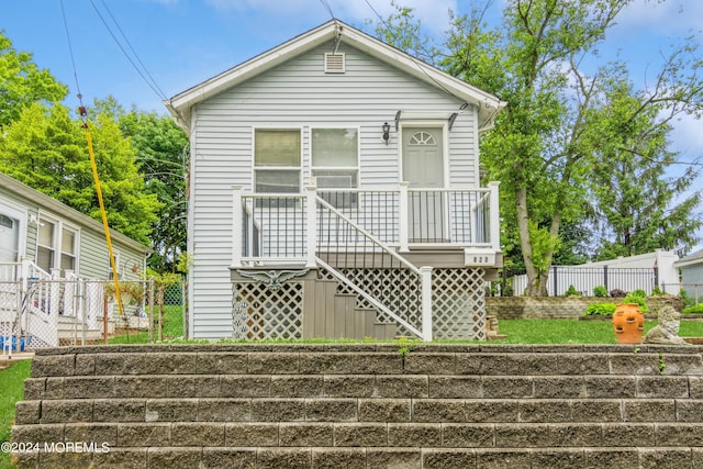 view of front of property with fence