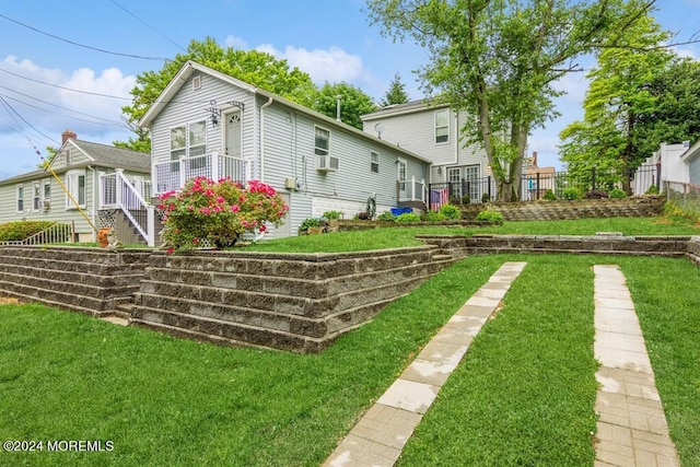 exterior space featuring fence and a yard