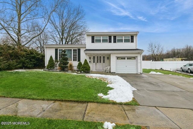 view of front of house with concrete driveway, fence, a front lawn, and an attached garage