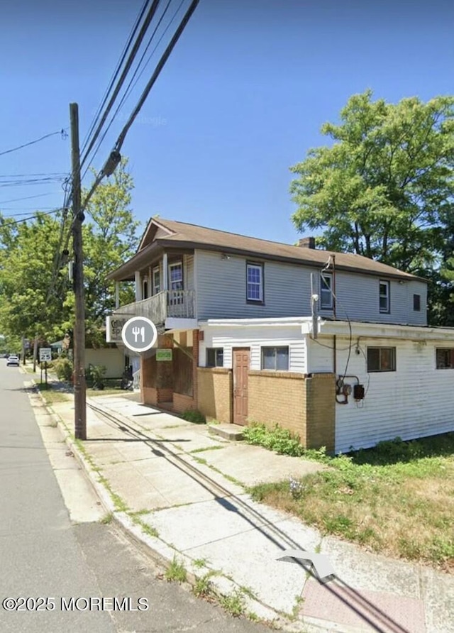 view of front of house featuring brick siding