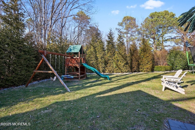 view of playground with a yard