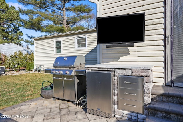 view of patio / terrace featuring a grill