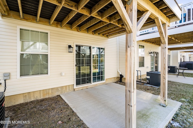 view of patio with central AC unit