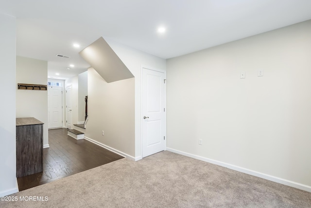 interior space featuring recessed lighting, visible vents, and baseboards