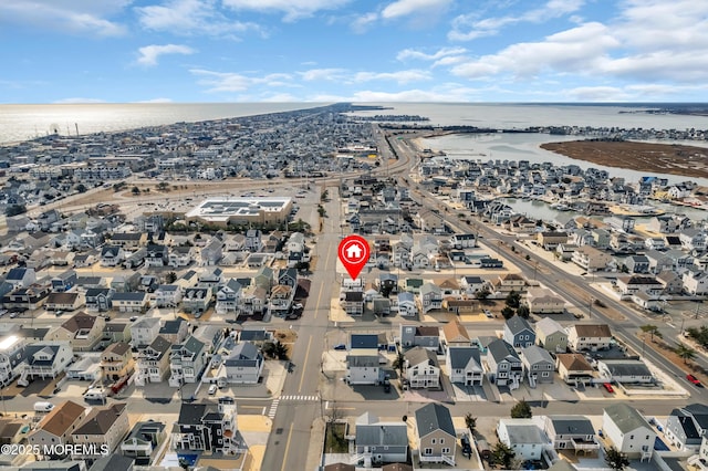 aerial view featuring a water view and a residential view