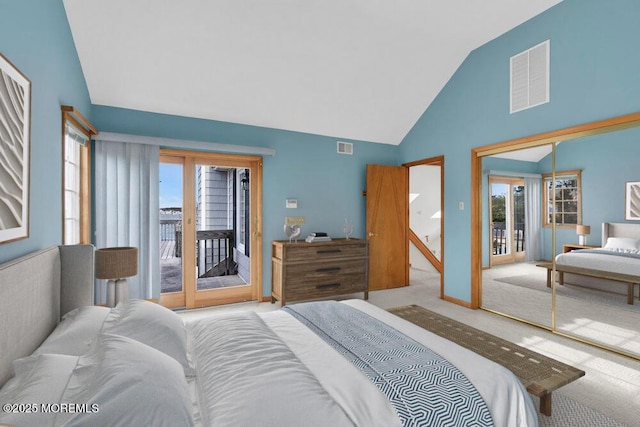 bedroom featuring access to outside, multiple windows, carpet, and visible vents