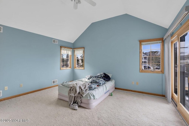 bedroom featuring carpet floors, lofted ceiling, visible vents, ceiling fan, and baseboards