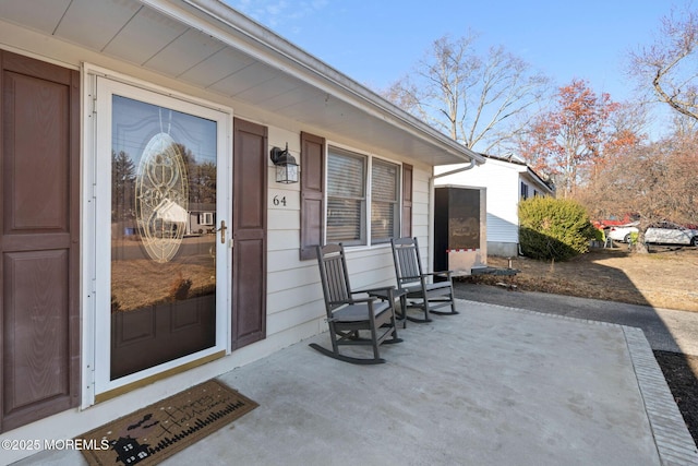 entrance to property with covered porch