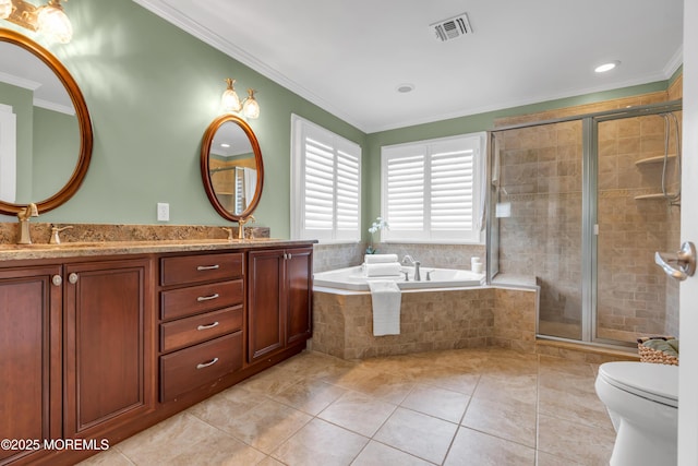 bathroom with a garden tub, crown molding, visible vents, toilet, and a sink