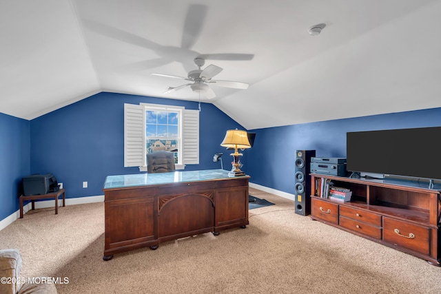 office area with light carpet, ceiling fan, baseboards, and lofted ceiling