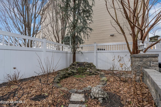 view of yard featuring a fenced backyard