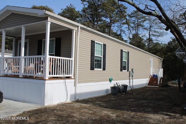 view of home's exterior featuring a porch