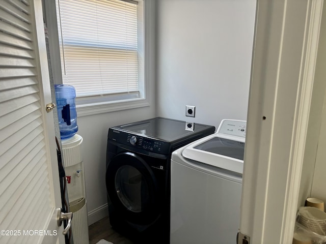 clothes washing area with laundry area and separate washer and dryer