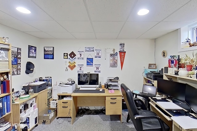 home office with a paneled ceiling