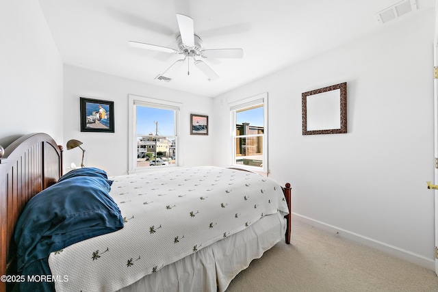 605 Broadway, Barnegat Light, NJ 08006 - bedroom with baseboards, visible vents, carpet floors, and ceiling fan