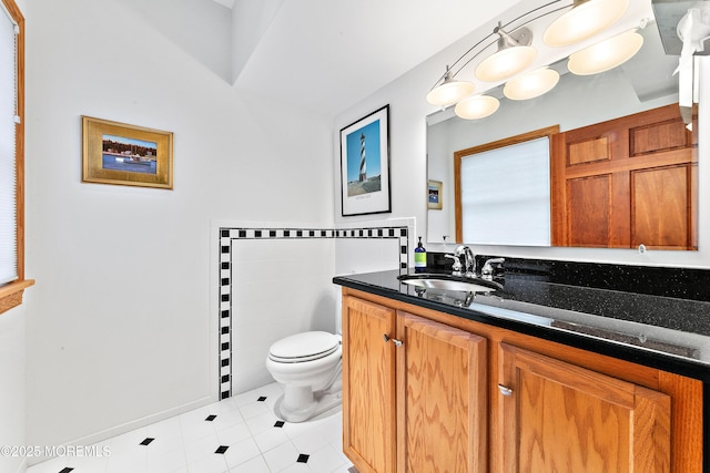 605 Broadway, Barnegat Light, NJ 08006 - bathroom featuring tile walls, toilet, and vanity