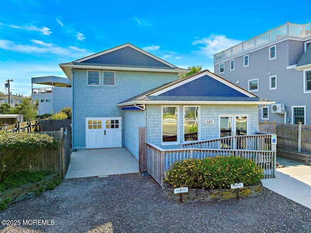 605 Broadway, Barnegat Light, NJ 08006 - view of front of home with a garage and fence