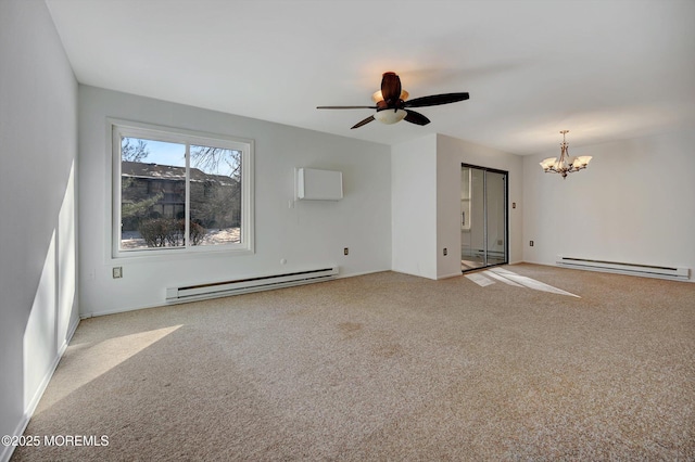 unfurnished room featuring ceiling fan with notable chandelier, baseboard heating, and light colored carpet