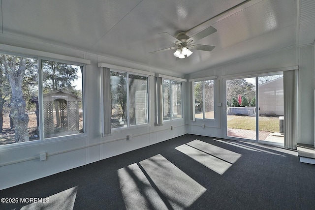 unfurnished sunroom featuring lofted ceiling and ceiling fan