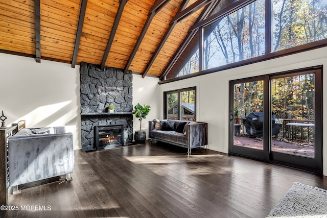 living room featuring wood ceiling, a stone fireplace, wood finished floors, high vaulted ceiling, and beamed ceiling