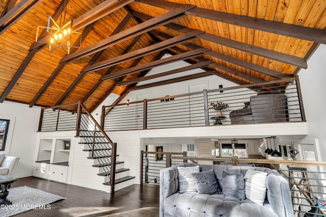 living room with high vaulted ceiling, wood ceiling, beamed ceiling, and wood finished floors