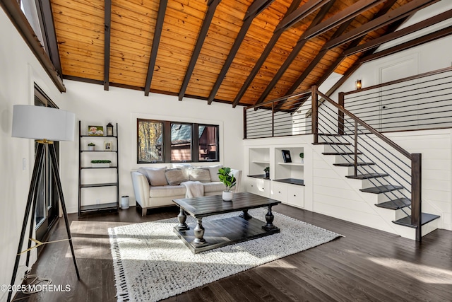 living room featuring dark wood-style floors, wood ceiling, stairway, and built in features