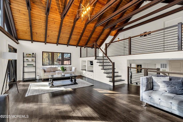 living area with dark wood-style flooring, beam ceiling, stairway, high vaulted ceiling, and wooden ceiling