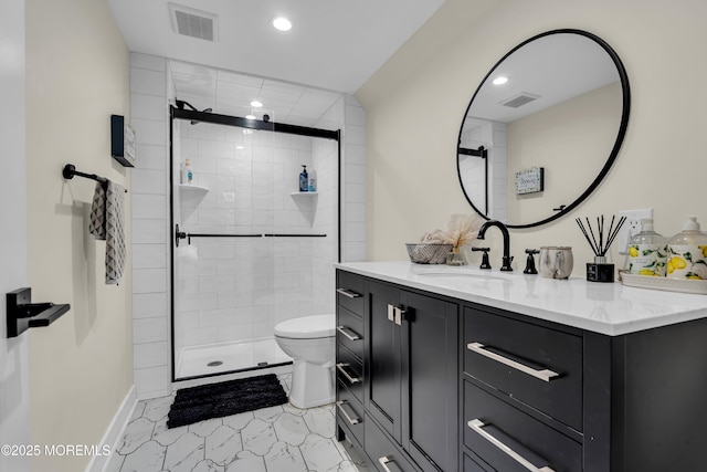 full bathroom with a stall shower, visible vents, vanity, and toilet