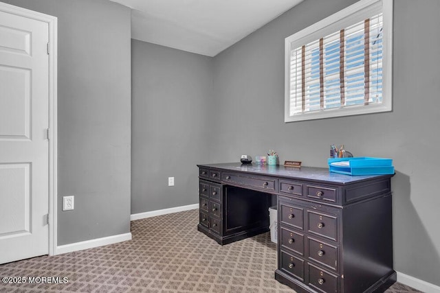 office with light colored carpet and baseboards