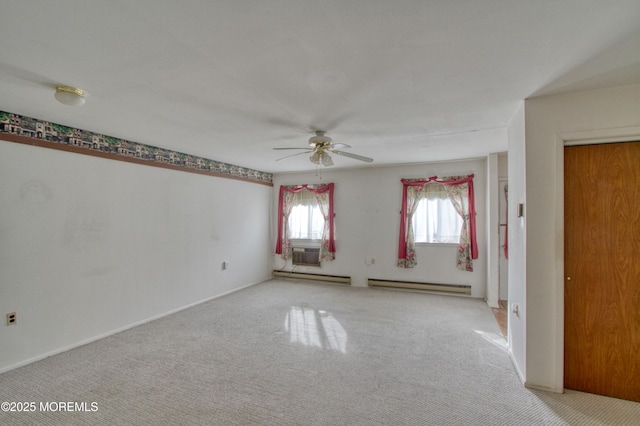 unfurnished room with a ceiling fan, light colored carpet, and baseboard heating