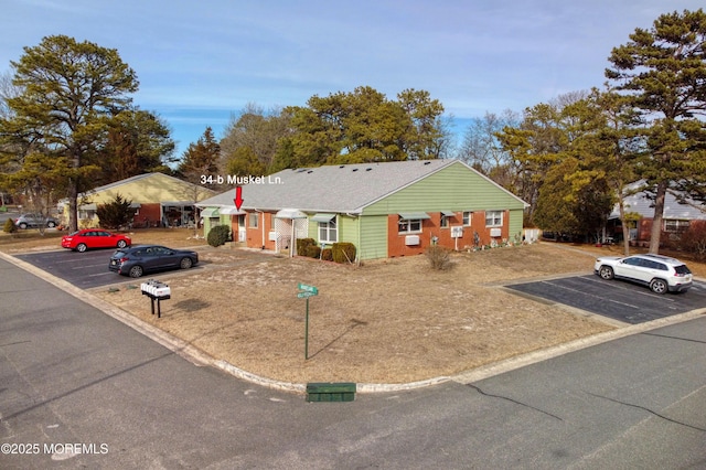 single story home with uncovered parking