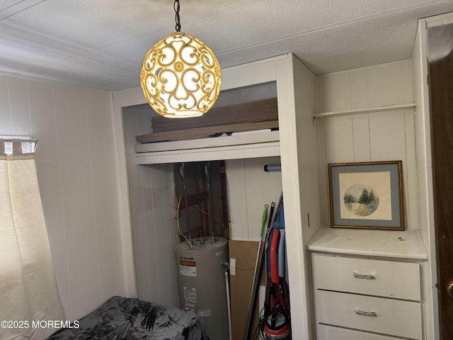 closet featuring water heater