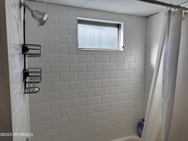 bathroom featuring shower / bath combo with shower curtain