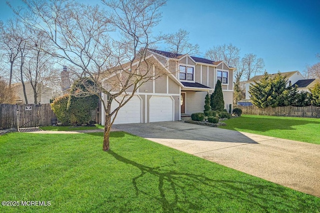 tudor home featuring stucco siding, concrete driveway, a front yard, fence, and a garage