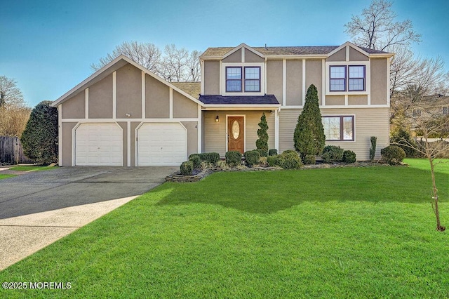 tudor-style house featuring a front lawn, concrete driveway, an attached garage, and stucco siding