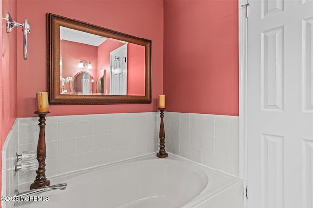 bathroom with a garden tub