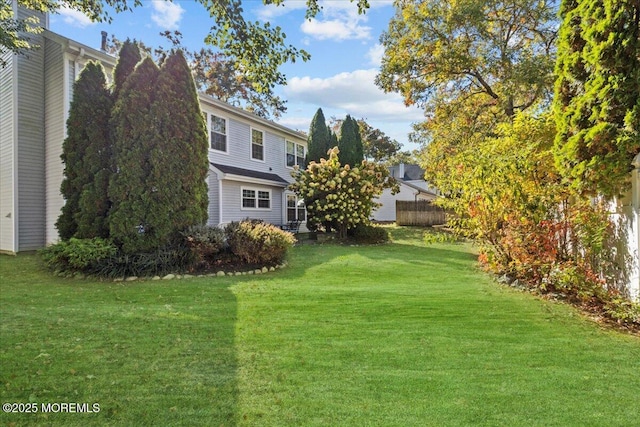 view of yard featuring fence