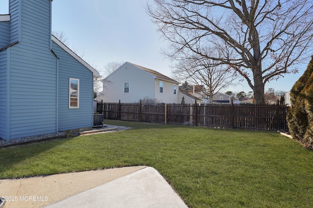 view of yard featuring a patio area and fence