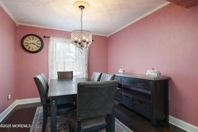 dining room with crown molding, dark wood-style flooring, and baseboards