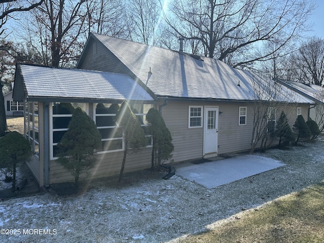 rear view of property with a patio