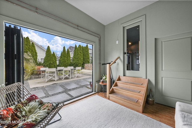 entryway with stairway and wood finished floors