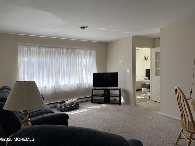 living room with visible vents, light carpet, and baseboards