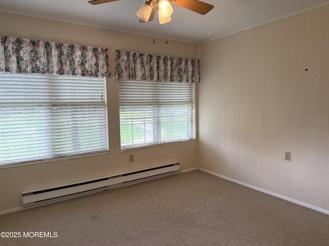 7B Cambridge Cir Unit B, Manchester, NJ 08759 - empty room featuring baseboard heating, ceiling fan, carpet floors, and crown molding