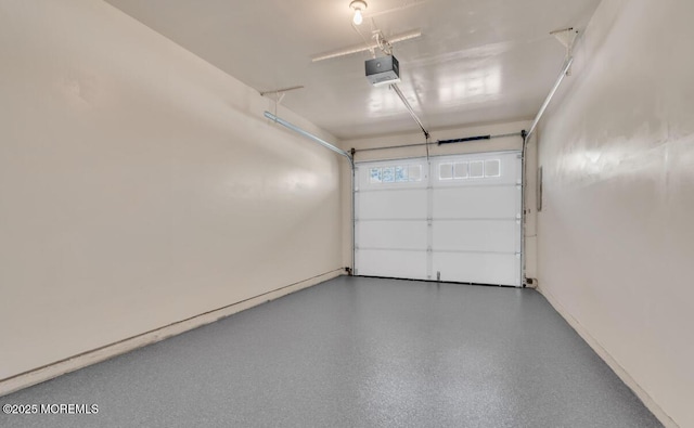 7B Cambridge Cir Unit B, Manchester, NJ 08759 - garage featuring a garage door opener and baseboards