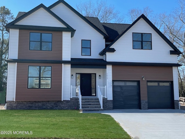 view of front of house with a garage, a shingled roof, driveway, stone siding, and a front lawn