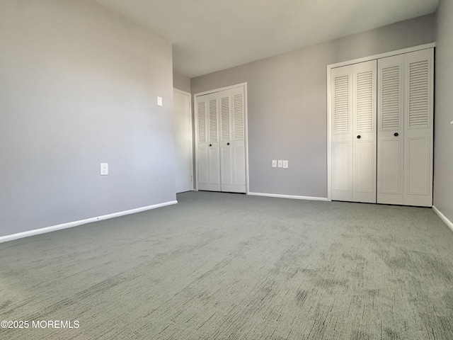 61B Hedge Dr, Lakewood, NJ 08701 - unfurnished bedroom featuring baseboards, two closets, and carpet flooring