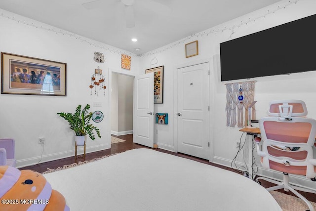 bedroom with recessed lighting, wood finished floors, a ceiling fan, and baseboards