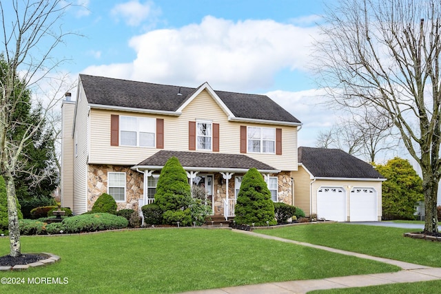 view of front of property featuring an attached garage, stone siding, a chimney, and a front lawn