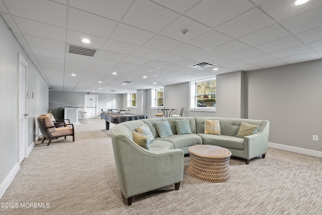 living area featuring light carpet, baseboards, visible vents, and recessed lighting