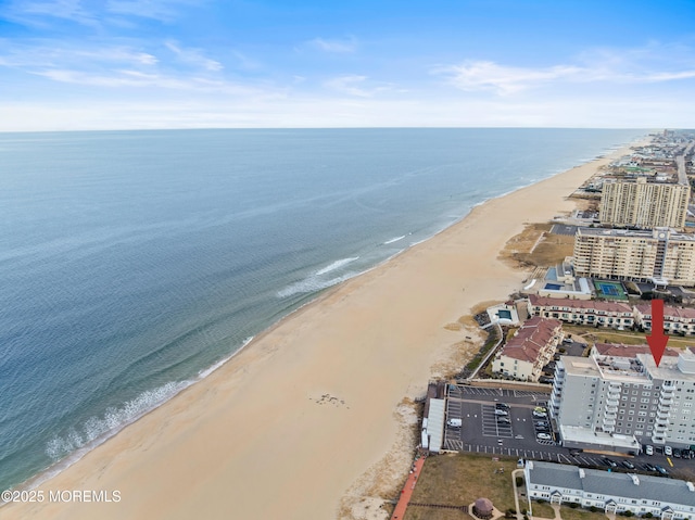 aerial view featuring a beach view and a water view